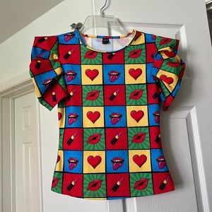 Super vibrant and cool NWOT shein top. Never worn. Size S (US 4).